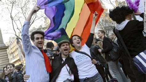 france signs same sex marriage bill into law