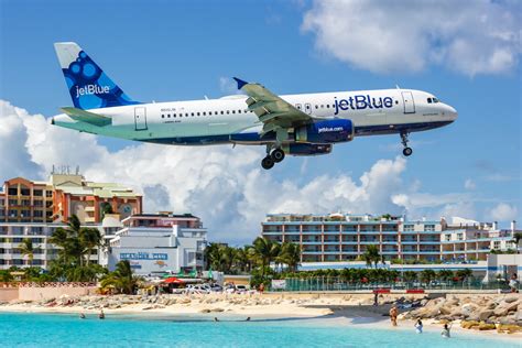 book holiday travel     jetblue flights   vacations  points guy