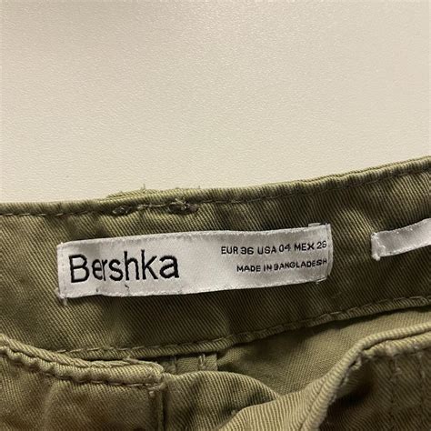 bershka khaki cargo trousers barely worn  flaws depop