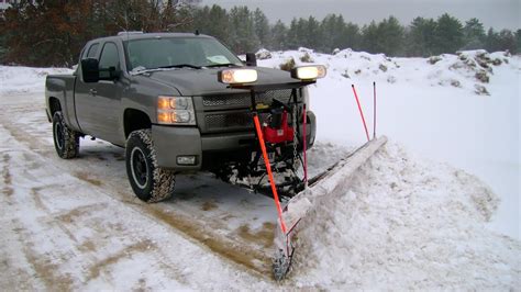 snowplowing  silverado hd western pro plow youtube