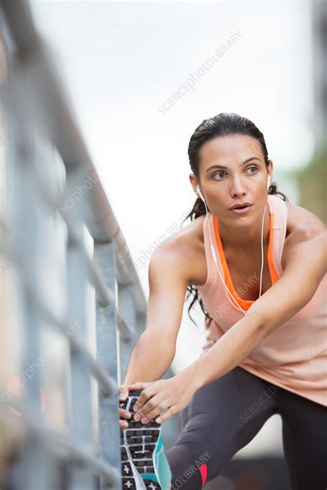 Woman Stretching Her Legs Before Exercise Stock Image F014 8628