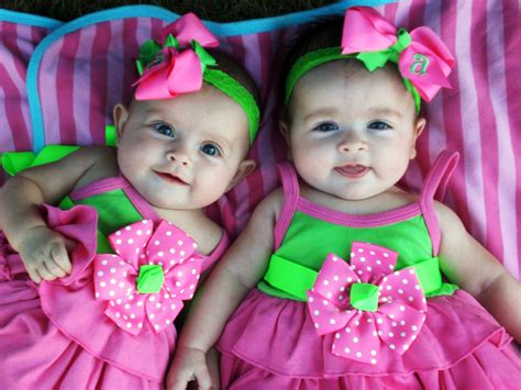 dressing   tiny twins  grace  eloquence baby couture india