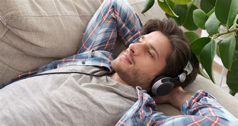 relaxed man listening   headphones stock footage sbv  storyblocks
