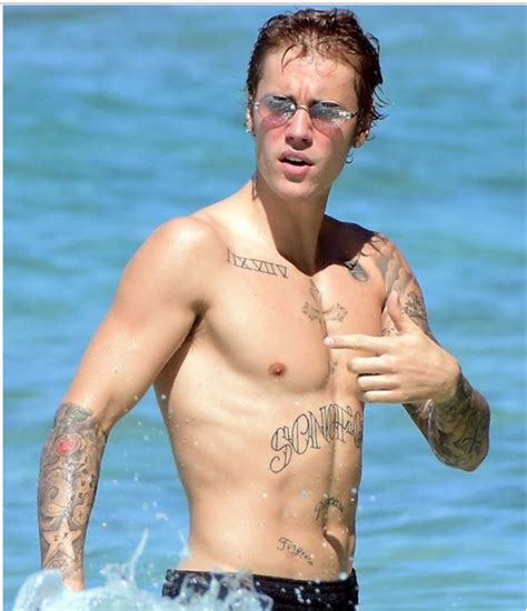 justin bieber shows off his hot muscular body in barbados