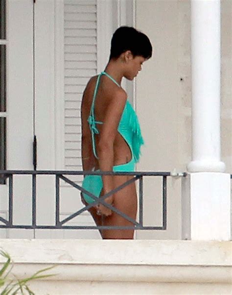 rihanna in swimsuit at hotel balcony in barbados hawtcelebs