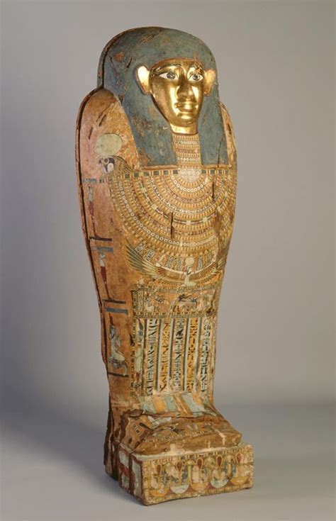 An Ancient Egyptian Statue Is Shown In This Image