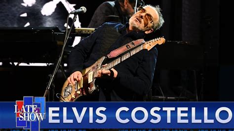 watch elvis costello s interview and performance on colbert peace music