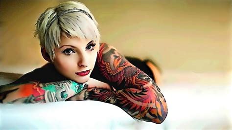 blonde with short hair and ink sleeves nice wallpaper