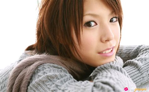 hitomi oda asian shows nice cleavage on sweater and some