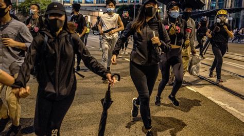 hong kong banned masks at protests masked crowds protested the ban