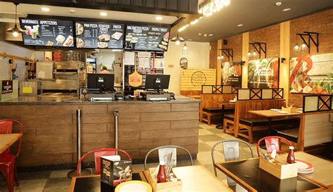 pizza hut launches   open kitchen format store