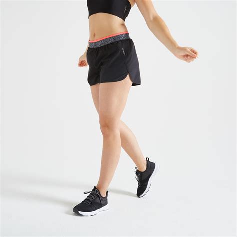 100 women s fitness cardio training loose fit shorts black decathlon