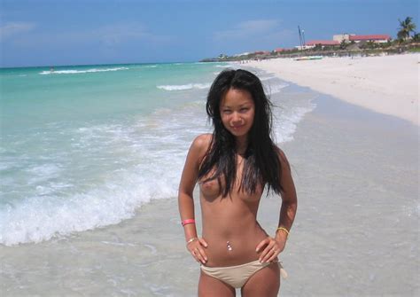 wild and topless at the nude beach sexy asian girl friends on vacation so you want an asian