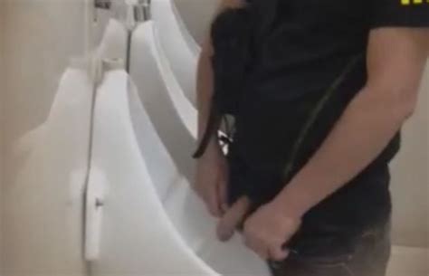 uncut dick peeing at the urinal spycamfromguys hidden cams spying on men