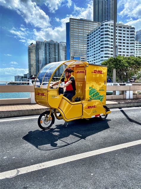 dhl  reef technology launch pilot   ecofriendly cargo bikes  deliveries  downtown miami