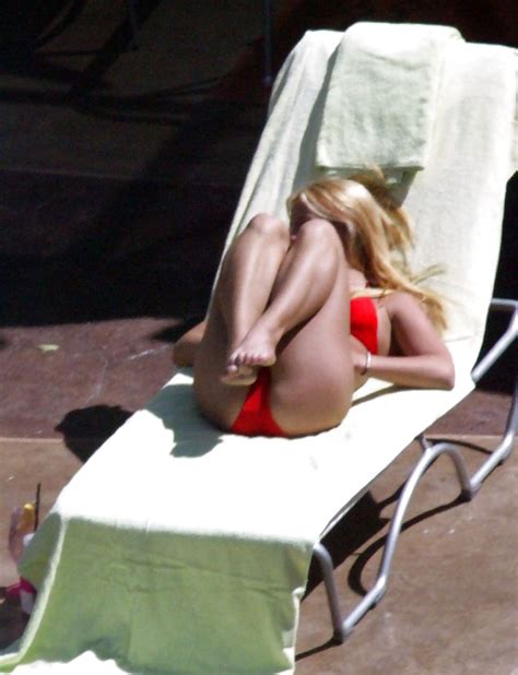 britney spears flaunting her ass and pussy in a red bikini
