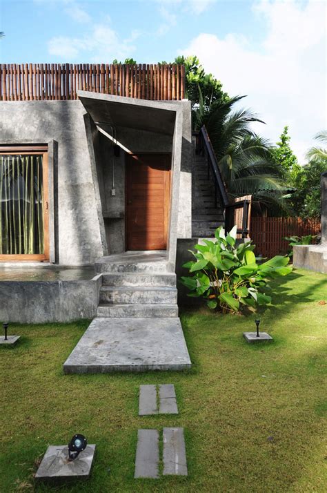 exquisite house  modern concrete flat roof  wood elements  ko samui thailand