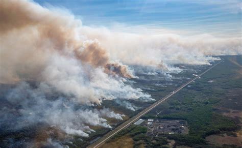 firefighters continue  defend high level alberta wildfire today
