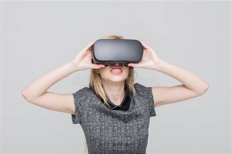 Blonde Woman In Vr Headset On Grey Background Hardcore Moments Stock