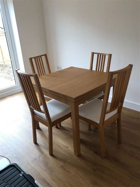 ikea dining table   chairs extendable bjursta model  ringwood