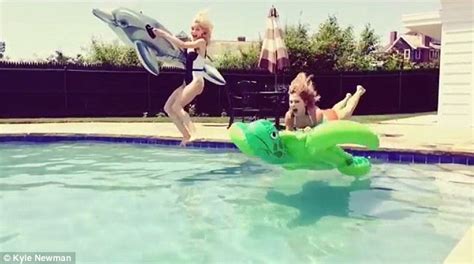 taylor swift larks around in swimming pool with jaime king in video daily mail online