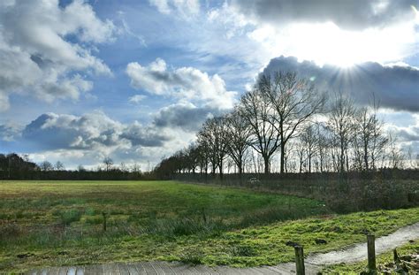 jozef van der heijden natuurfotografie cumuluswolken na een grijze ochtend