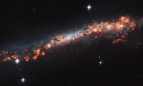hubble views spiral galaxy orientated  edge