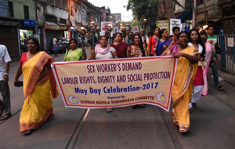 sex workers rallied with posters torches and shouted slogans for their