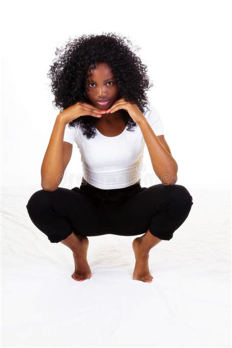 attractive skinny african american teen girl squatting stock image image of girl woman 47606681