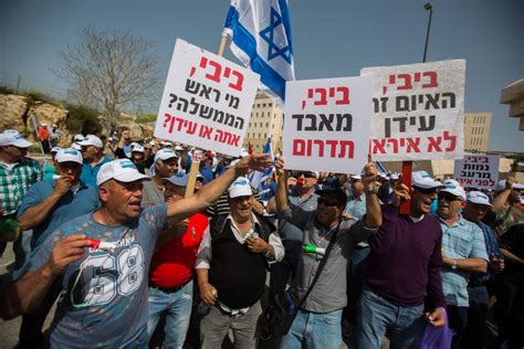 workers plan massive strike  south  protest firings  times  israel