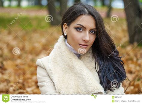facial portrait of a beautiful arab woman warmly clothed