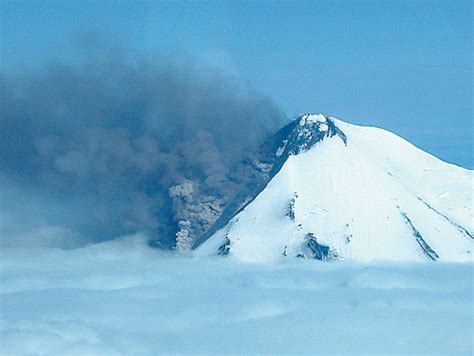 smoke pours from the erupting pavlof volcano on the alaska peninsula 950 km southwest of