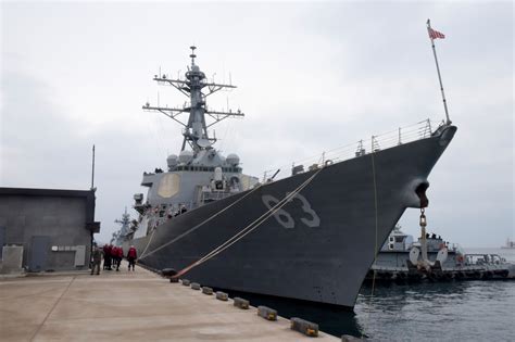 destroyer sails  disputed island  south china sea