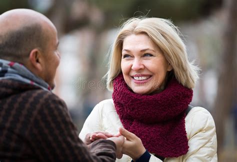 Happy Mature Couple Talking Outdoors Stock Image Image Of Bench