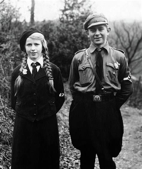 brother and sister wearing their hitler youth and bdm uniforms in