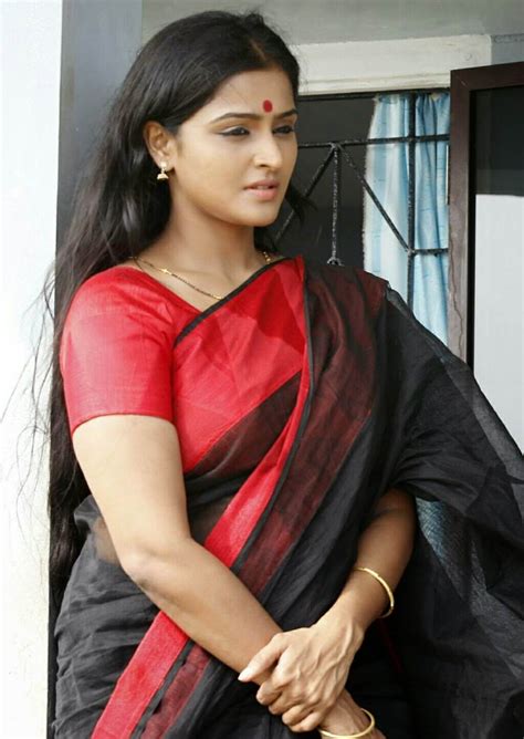 actress remya nambeesan long hair in black saree