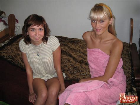 two barely legal russian babes take turns fucking a dick in bed pichunter