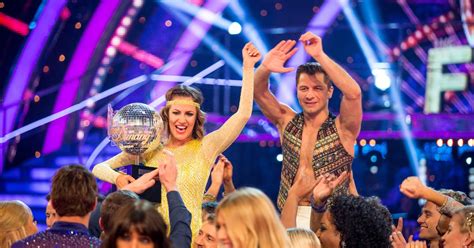 Strictly Come Dancing Caroline Flack Lifts The Glitterball Trophy In