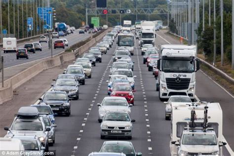 bank holiday weekend travel chaos as m25 is shut by lorry fire and roadworks continue daily