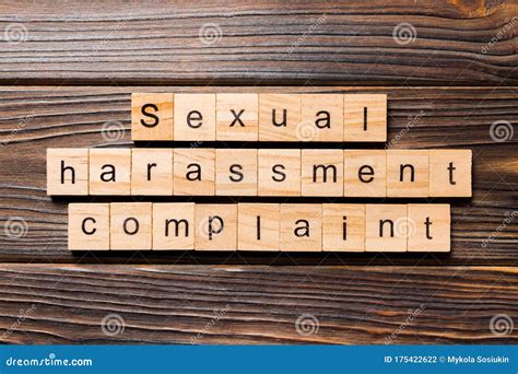Sexual Harassment Complaint Word Written On Wood Block Sexual