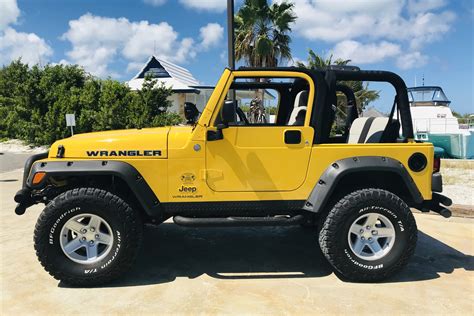 jeep wrangler  door yellow island life jeeps