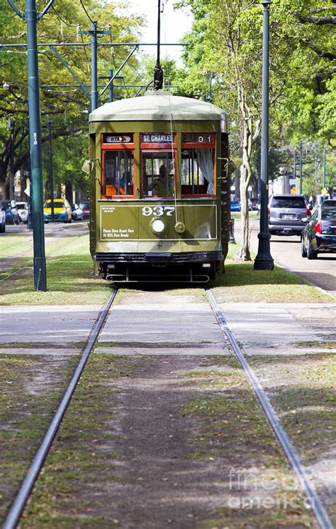 st charles avenue trolley train rolling   garden distr photograph  elite image