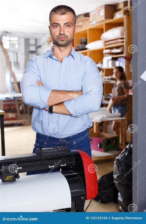 portrait  male employee  print shop   atelier   production  advertising stock