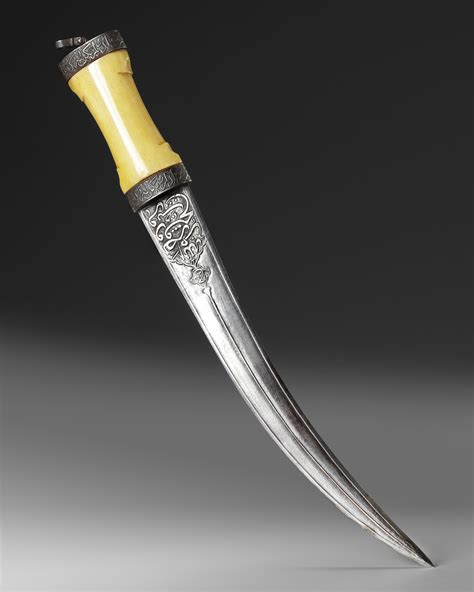 a bone hilted dagger with safavid watered steel blade persia 17th century