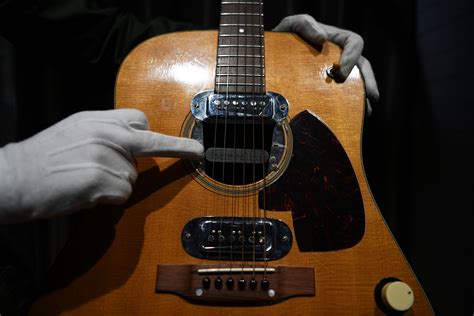kurt cobains mtv unplugged guitar sells  record   auction