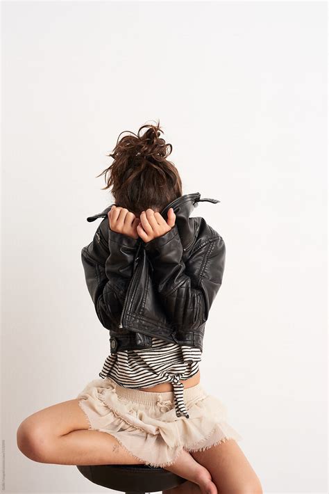 studio portrait  offended girl hiding face  leather jacket  guille faingold hide shy