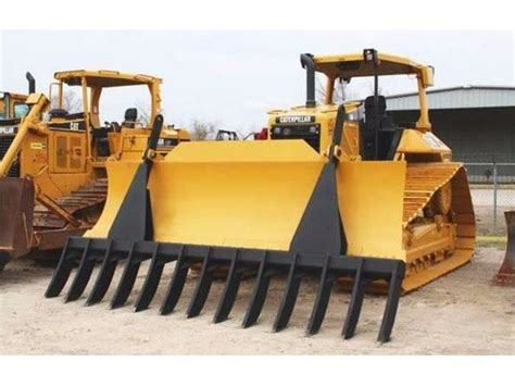 excavator thumbs root rakes bucket forks grapples special equipment highlands texas