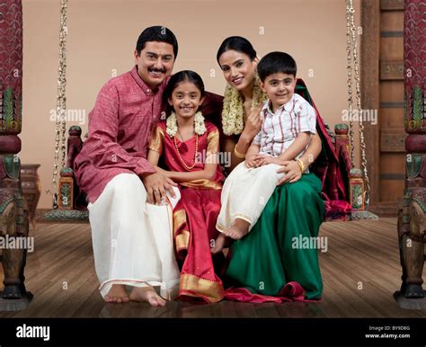 portrait   south indian family sitting   jhula stock photo