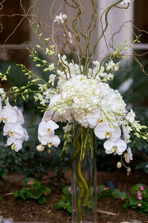 White Hydrangea And Cymbidium Orchid Centerpiece Orchids Orchid