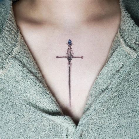 sword tattoo    chest micro realistic